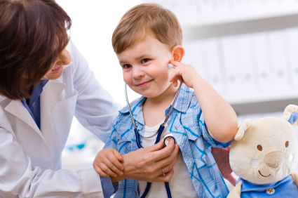 Small boy listening to stethascope